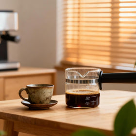 ALLCUP 4-cup carafe features angled pour spout for spill-free serving.