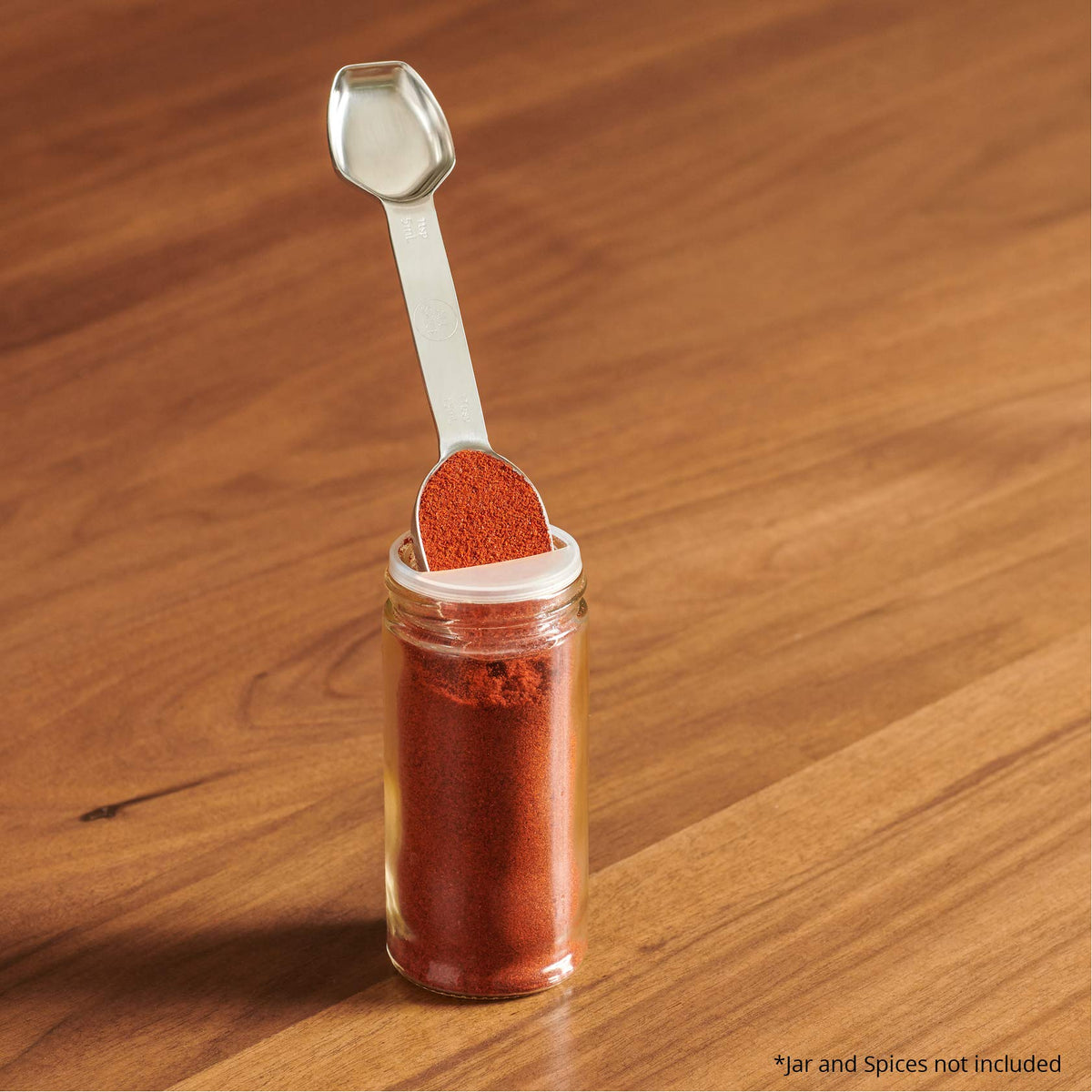 AllSpice narrow profile fits spice jars and scoops cleanly.