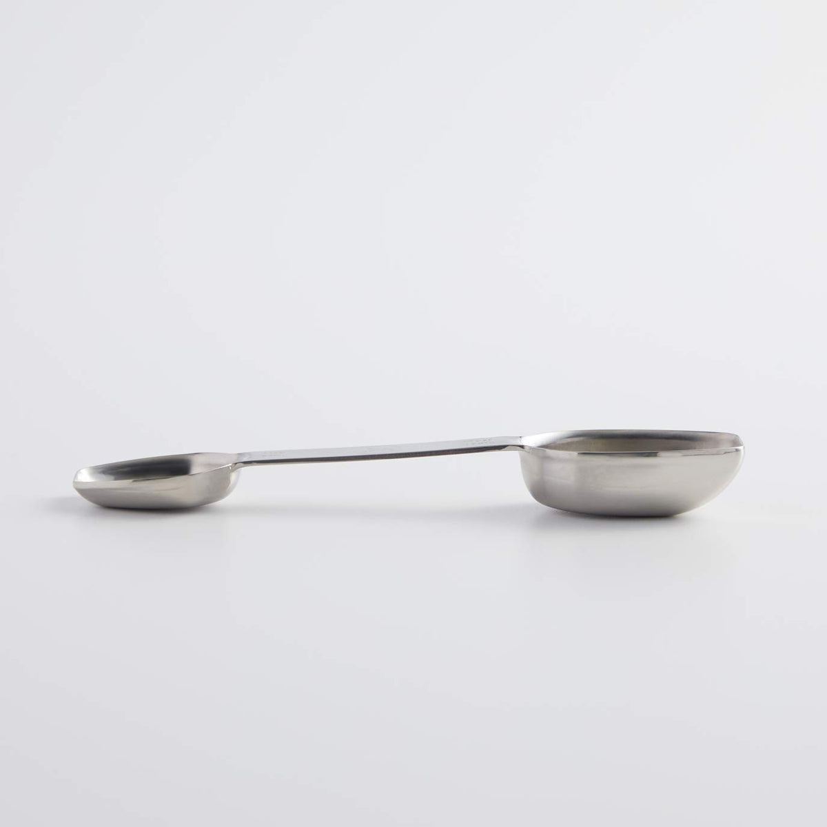 Stainless steel spoon is dishwasher safe and flavor-neutral.