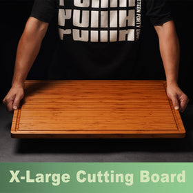 Allsum bamboo cutting board with integrated handles for easy transport and serving.