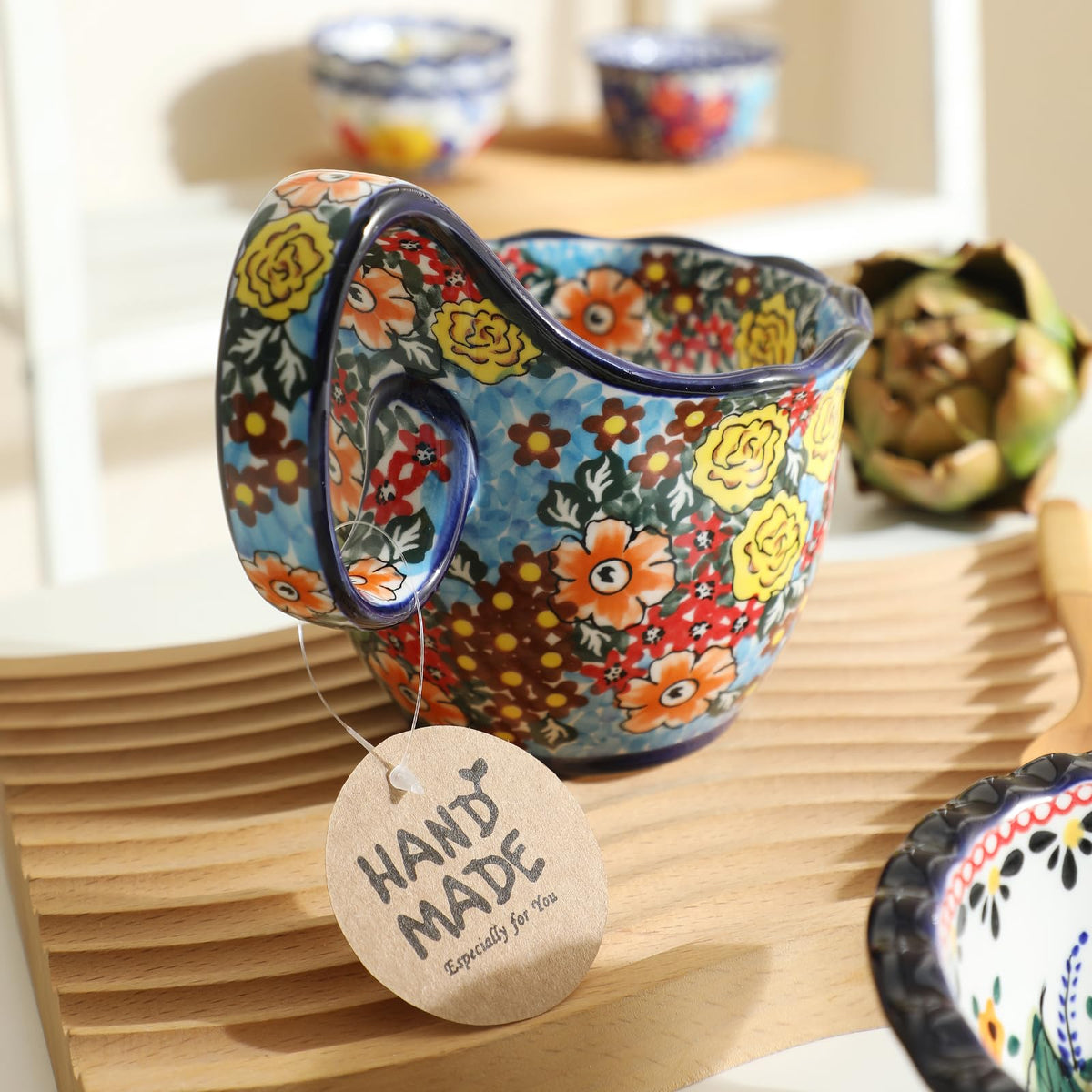 ALMA handpainted design detail close-up, floral motif adds charm to any table