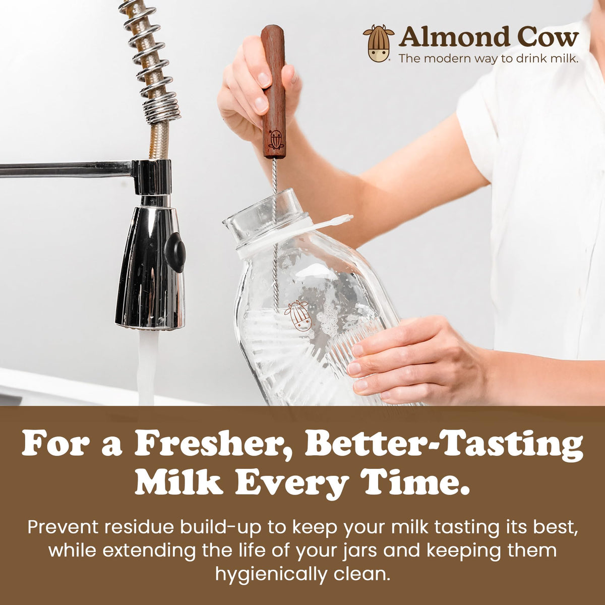 Almond Cow 60 oz glass pitcher with lid ready for fresh storage.