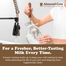 Almond Cow 60 oz glass pitcher with lid ready for fresh storage.