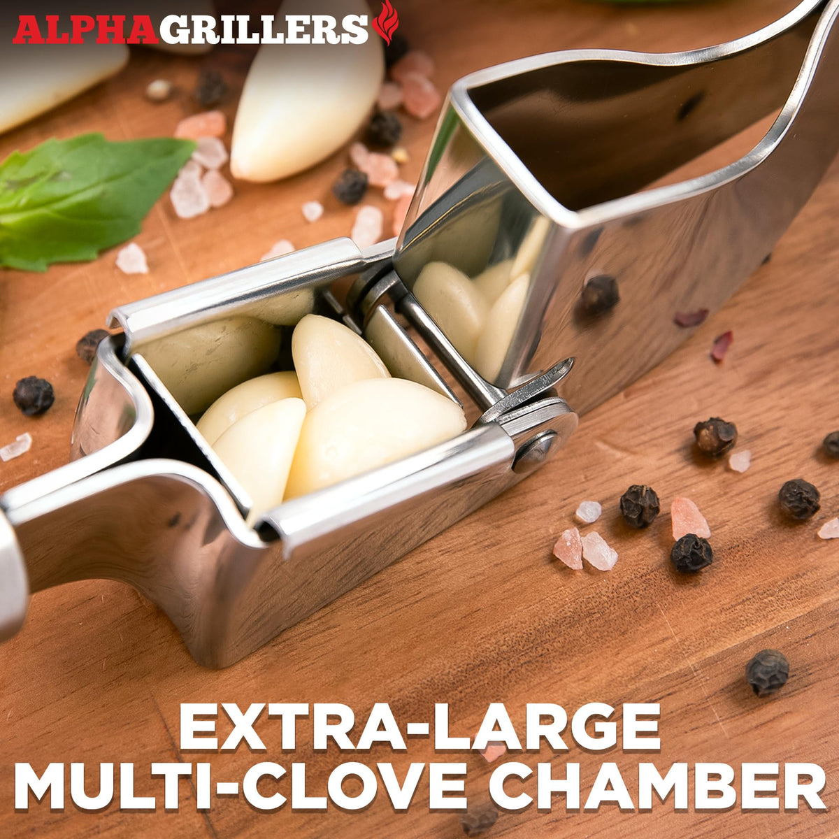 Alpha Grillers garlic press features a large chamber for peeled or unpeeled cloves.