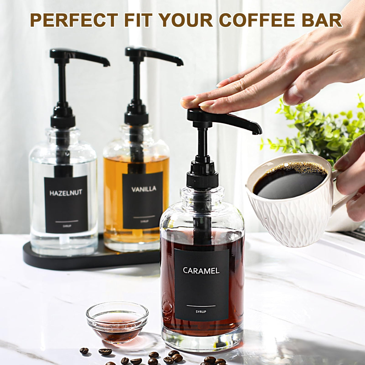 Black tray keeps ALPIRIRAL syrups neatly arranged at the counter.