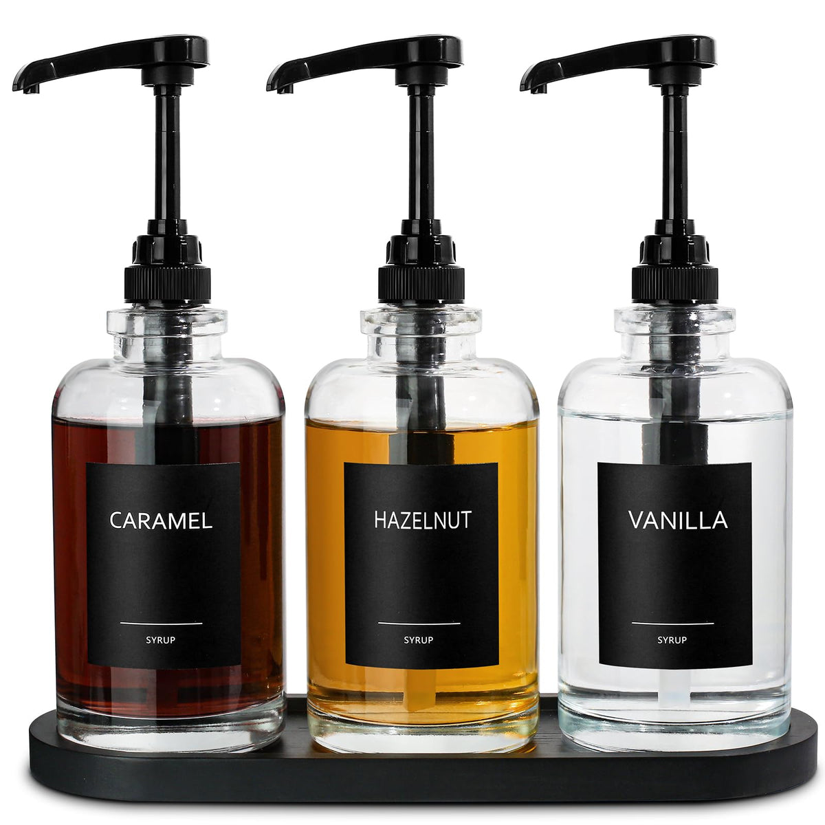 ALPIRIRAL black syrup dispenser set on a stylish coffee bar.