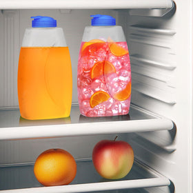Amazing Abby Fitly 64oz pitcher stored in the fridge demonstrates its large capacity.