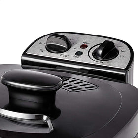 Amazon Basics deep fryer heat dial closeup showing adjustable temperature control.