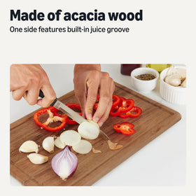 Amazon Basics acacia cutting board 12x8 inches ideal for cheese or fruit prep.