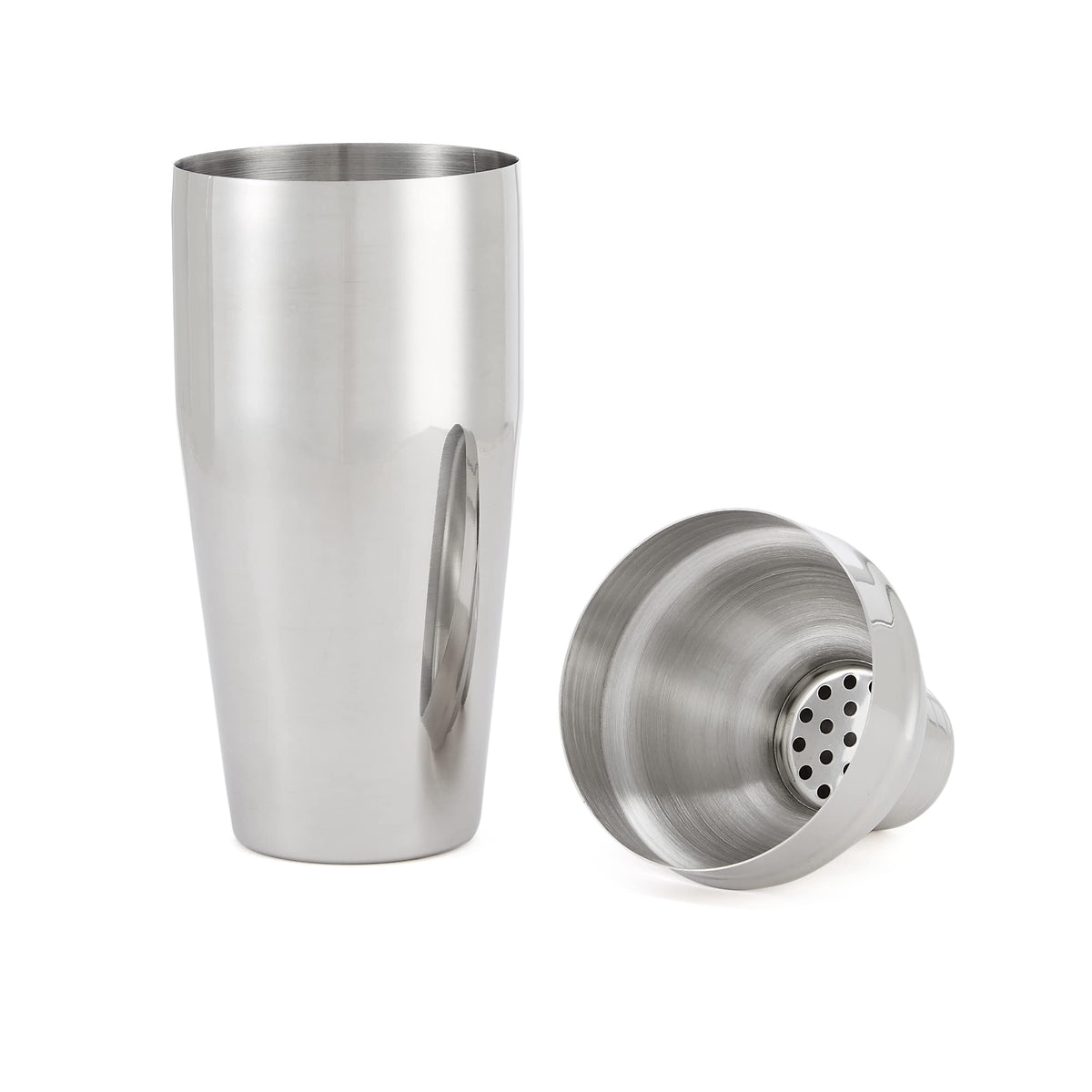 Amazon Basics bar tools with jigger, spoon, and strainer for precise mixing.
