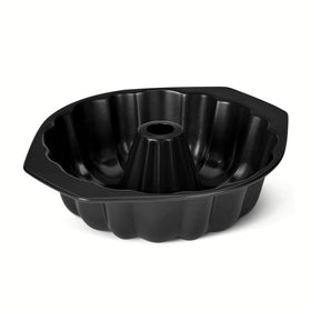 Amazon Basics Bundt pan with fluted design for even baking and easy release.
