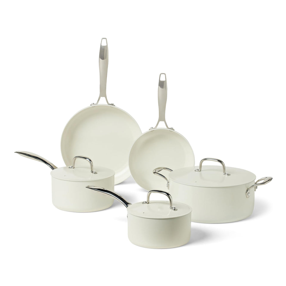 Amazon Basics ceramic nonstick 8-piece set displayed together for versatile home cooking and easy cleanup.