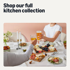 Amazon Basics cutting board with juice groove catches liquids during prep.
