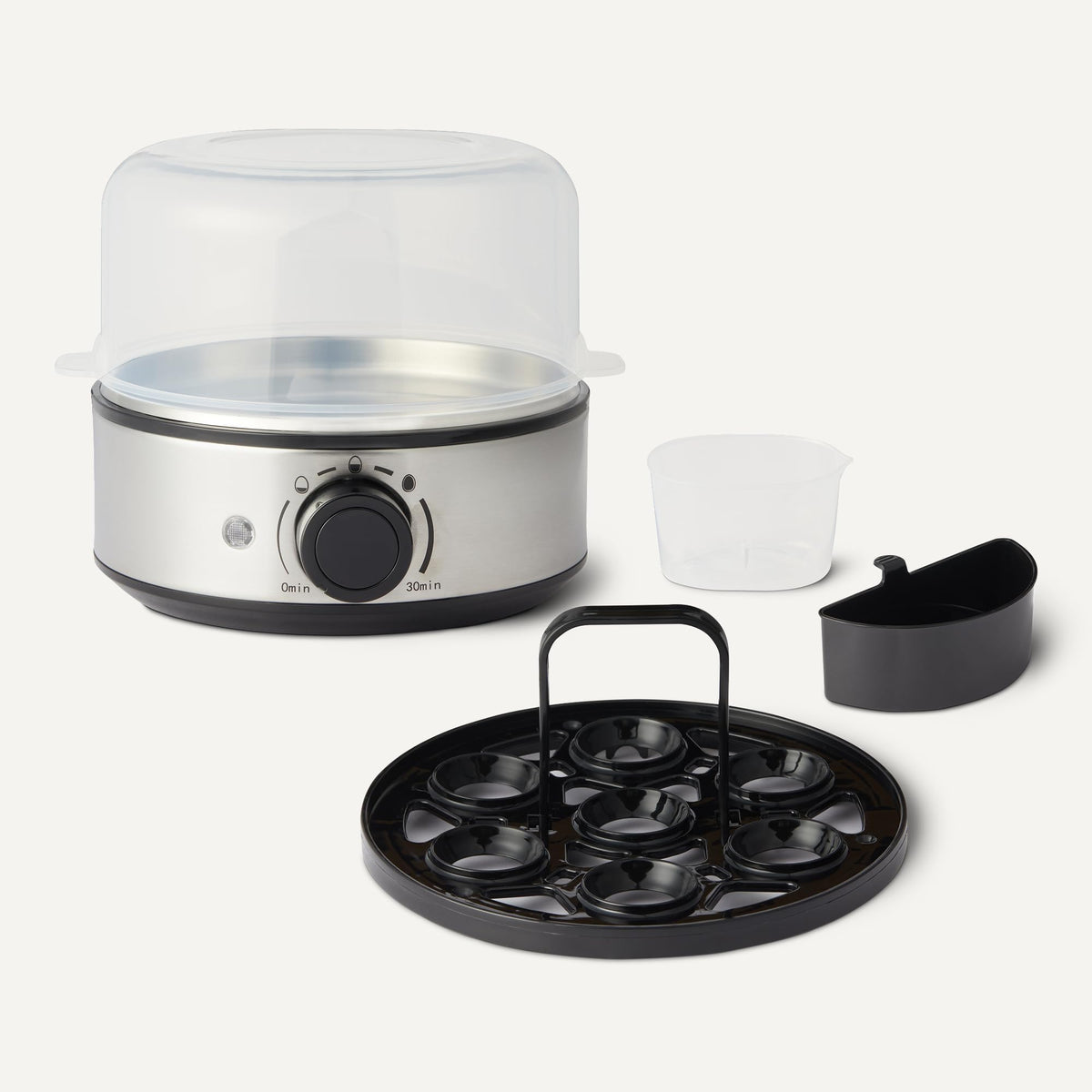 Amazon Basics egg cooker includes a poaching tray and egg holder for versatile options.