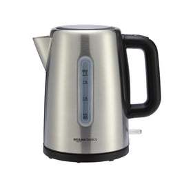 Amazon Basics electric kettle on its detachable base for easy cordless pouring.