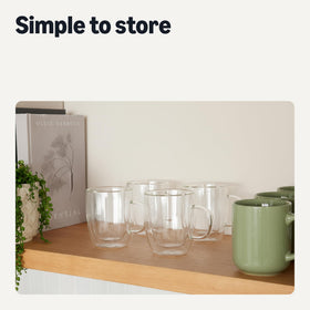 Amazon Basics glass mug with hot beverage on desk demonstrates everyday versatility