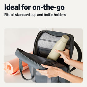 Amazon Basics bottle in hand demonstrating portable, comfortable grip for daily use