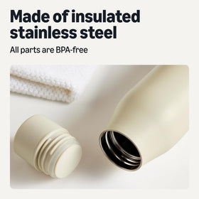Amazon Basics bottle interior lid view emphasizing BPA-free construction and easy cleaning