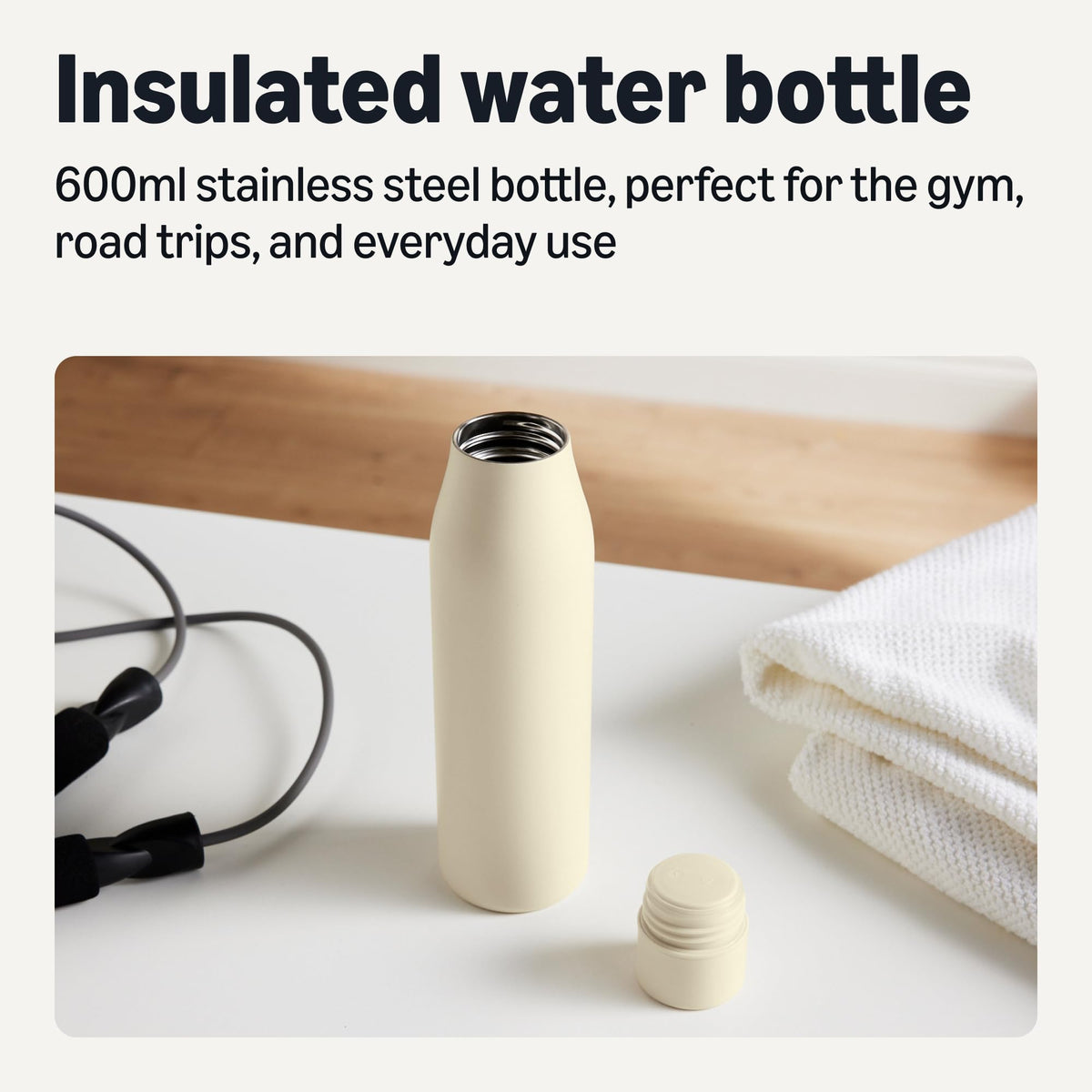 Amazon Basics water bottle side view highlighting slim cup-holder friendly design