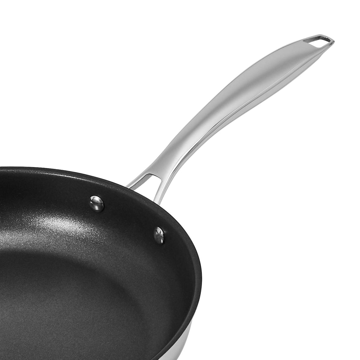 Amazon Basics non-stick coating close-up shows smooth surface for easy release