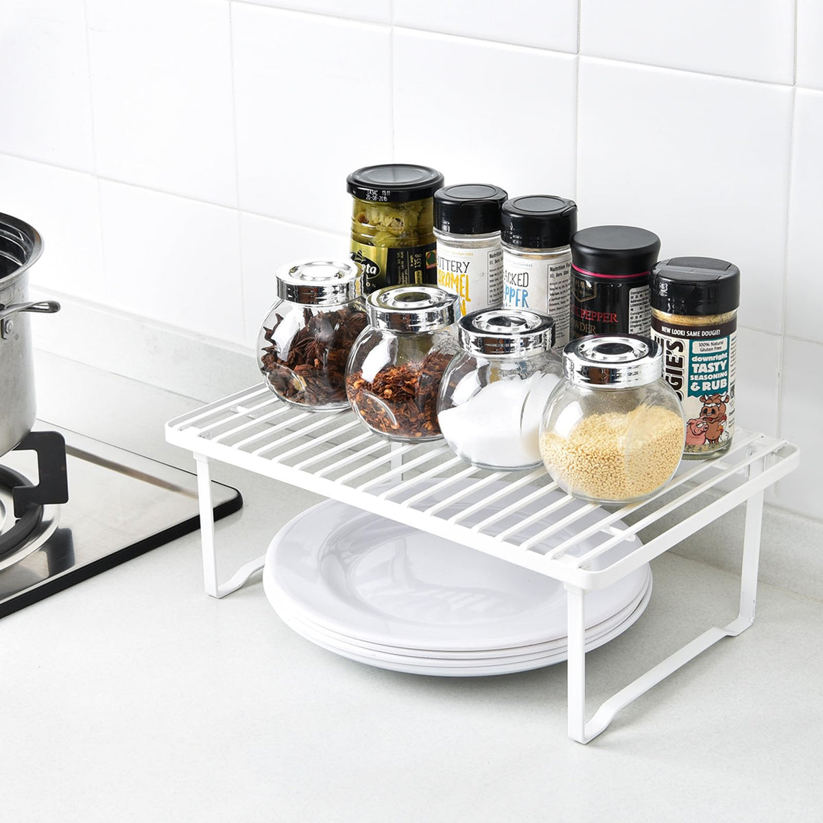 Amazon Basics stackable kitchen shelves holding cups to save cabinet space