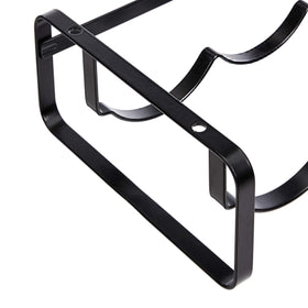 Amazon Basics black metal wine rack on a counter displaying durable steel construction.