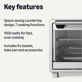 Amazon Basics toaster oven interior with air fryer basket and baking pan for versatile cooking.