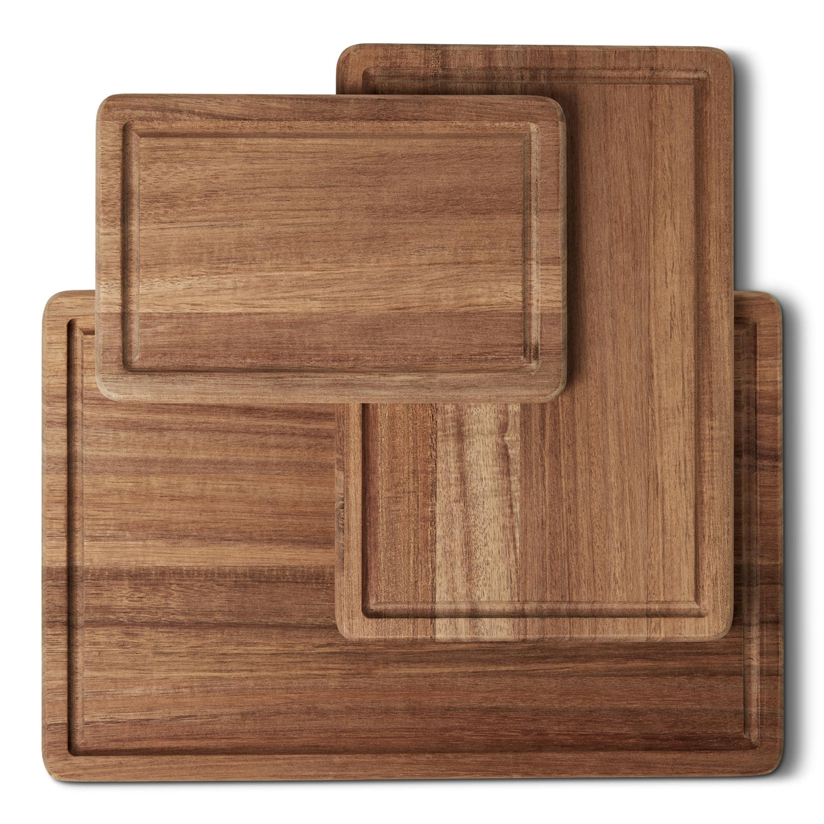 Amazon Basics acacia cutting board trio laid out for meal prep and serving.