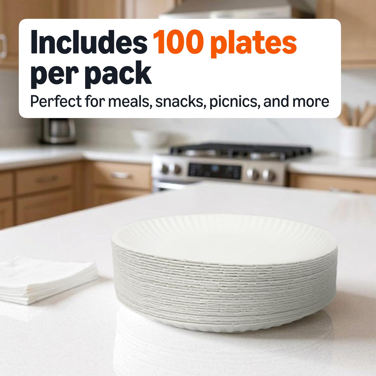 Amazon Basics 9-inch white plate on a picnic table at an outdoor party setting.