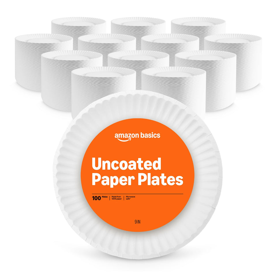 Amazon Basics 9-inch white plates stacked for a clean table setting, ideal for casual meals.