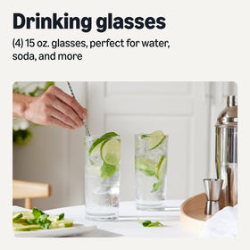 Amazon Basics 15 oz glasses on table, perfect for water at family meals.