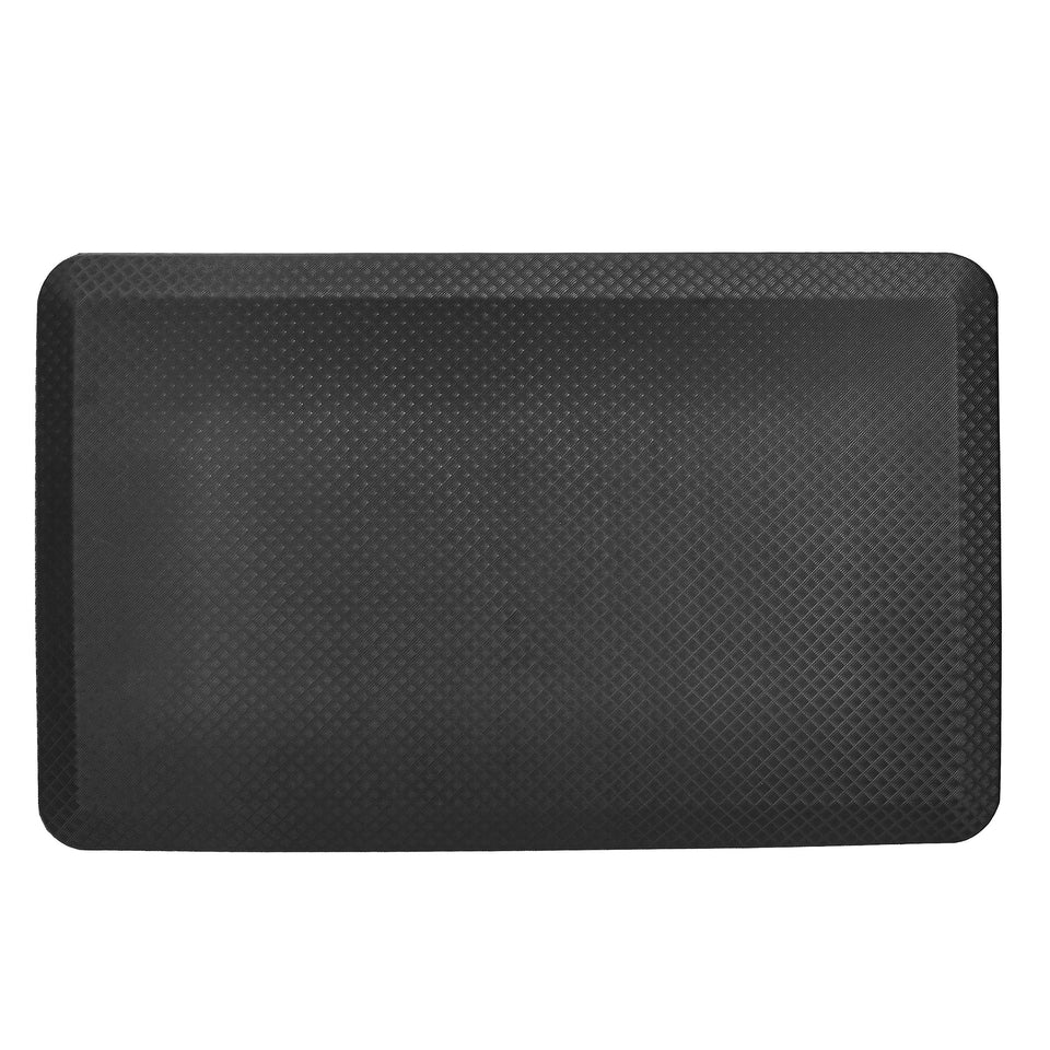 Amazon Basics rectangular anti-fatigue mat under a standing desk provides lasting comfort.