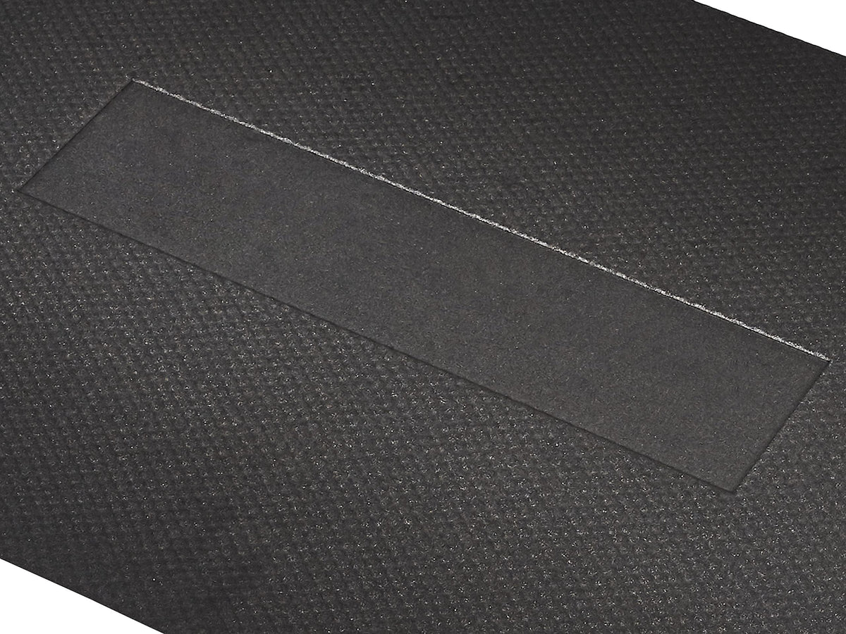 Amazon Basics anti-fatigue mat in a workshop area improves posture and balance.