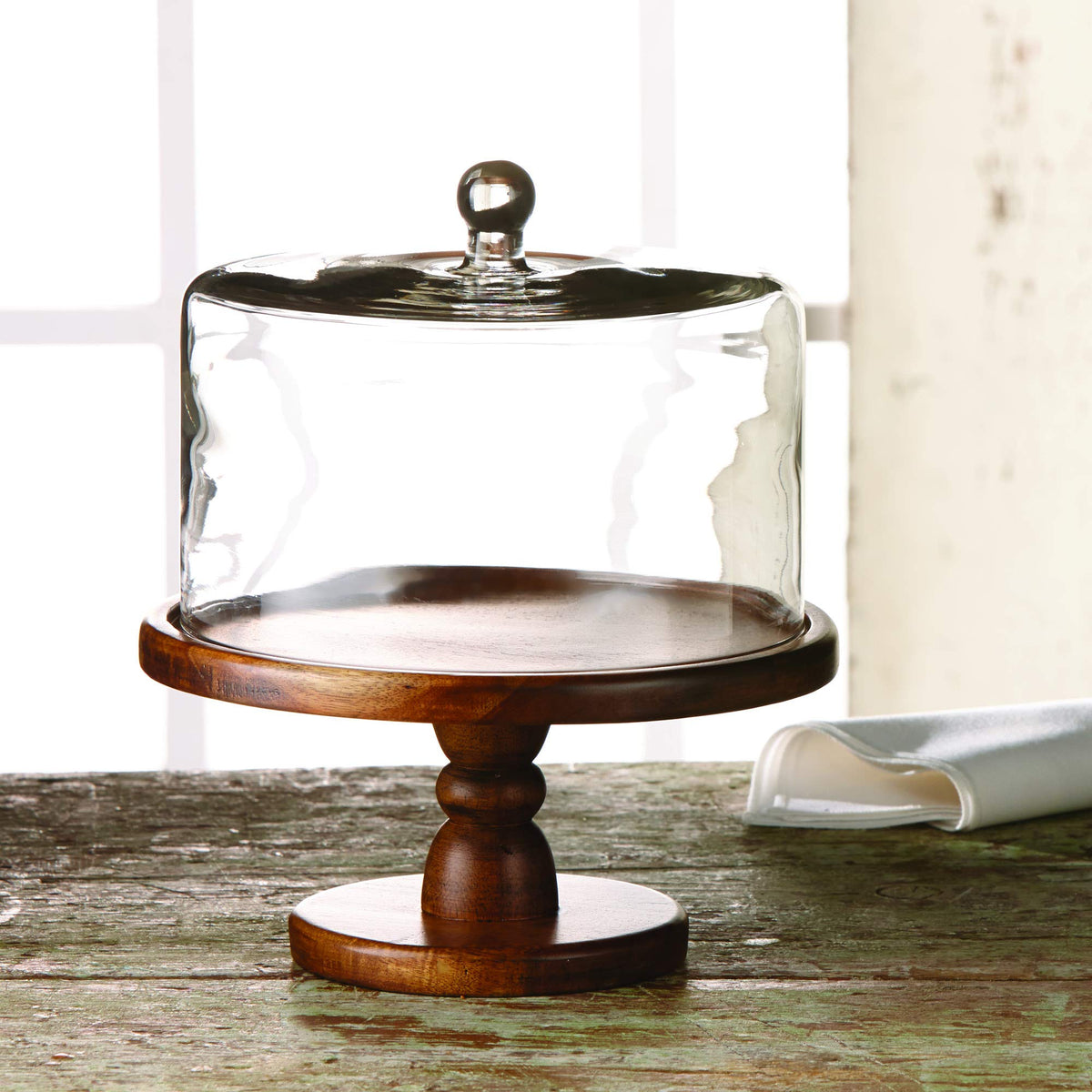 American Atelier Madera wooden base provides sturdy support for treats and displays