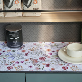 Amiitay Floral Shelf Liner keeps bathroom vanity surfaces dry.