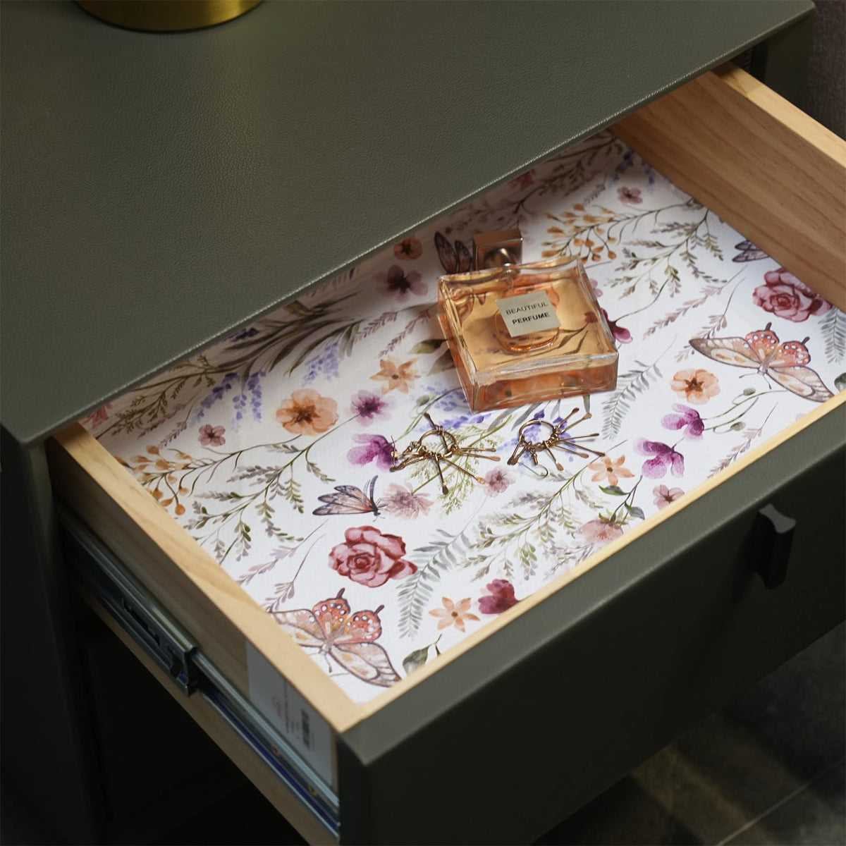 Amiitay Floral Shelf Liner organizes kitchen drawers with elegance.