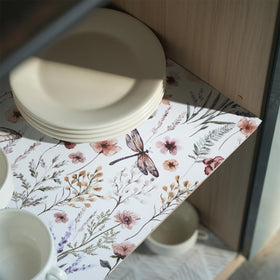 A Amiitay liner demonstrates waterproof, stain resistant surface on cabinet.