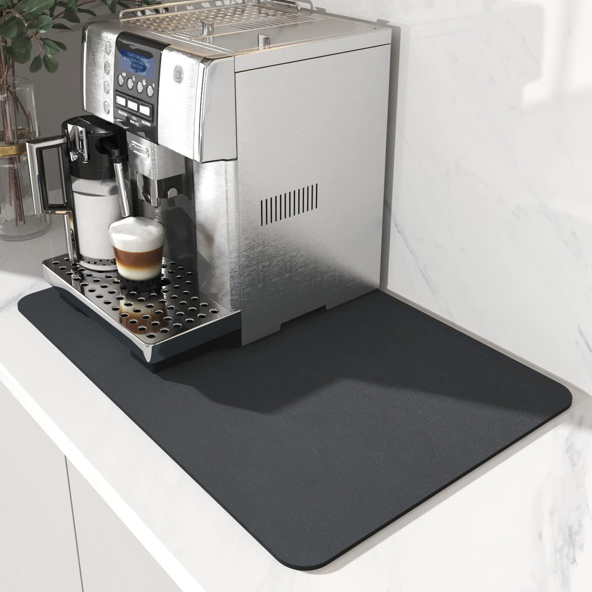 AMOAMI Coffee Mat with absorbent diatomite soaking up spills quickly.