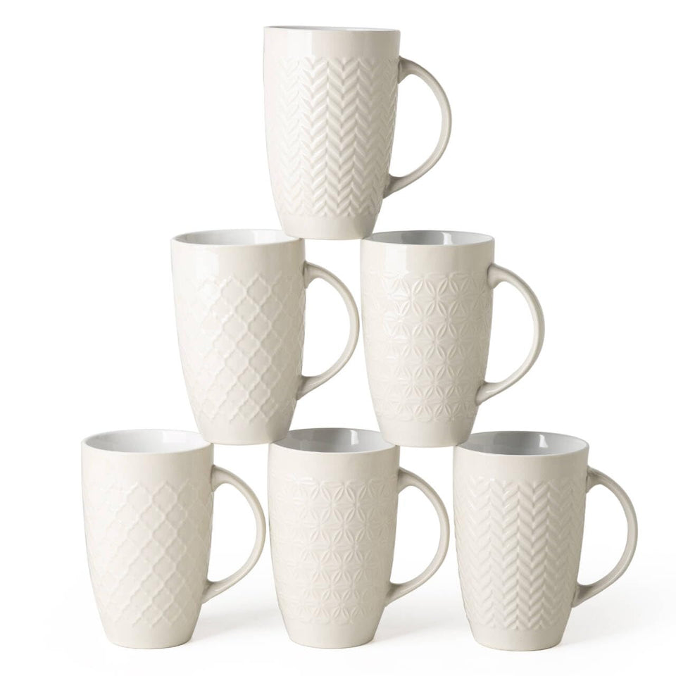 AmorArc extra-large coffee mug set on table, ideal for morning beverages and family gatherings.