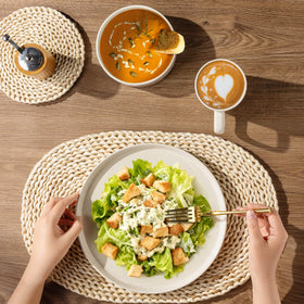 AmorArc six appetizer plates showcase sesame speckle interior.