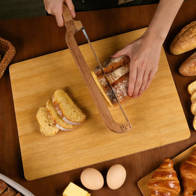 AMROAH bow bread knife shows a stainless-steel blade for durable sharpness.
