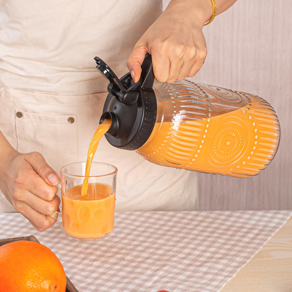 Amzcku wide-mouth glass jug makes pouring coffee or milk simple.