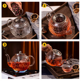 Amzcku teapot showing blooming tea in clear borosilicate glass.