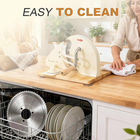 Anatole wooden base provides sturdy support during safe slicing.