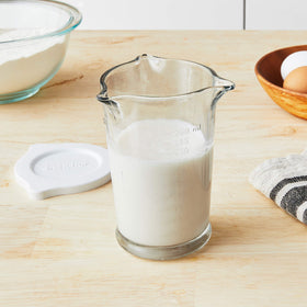 Anchor Hocking 8oz glass measuring cup featuring three pours for precise liquid transfer.