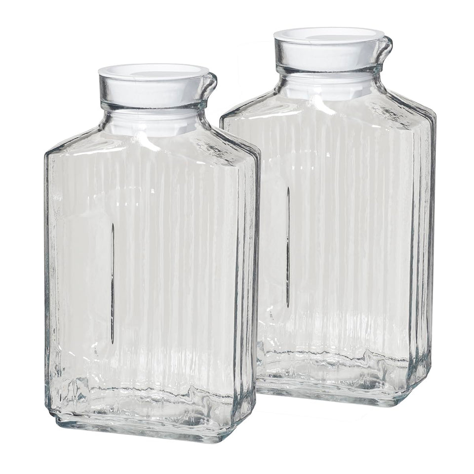 Anchor Hocking Bistro Pitcher 2 Qt pour-ready glass showcases vibrant beverages.