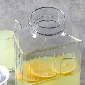 Anchor Hocking Bistro Pitcher crystal-clear glass enhances colorful drinks.