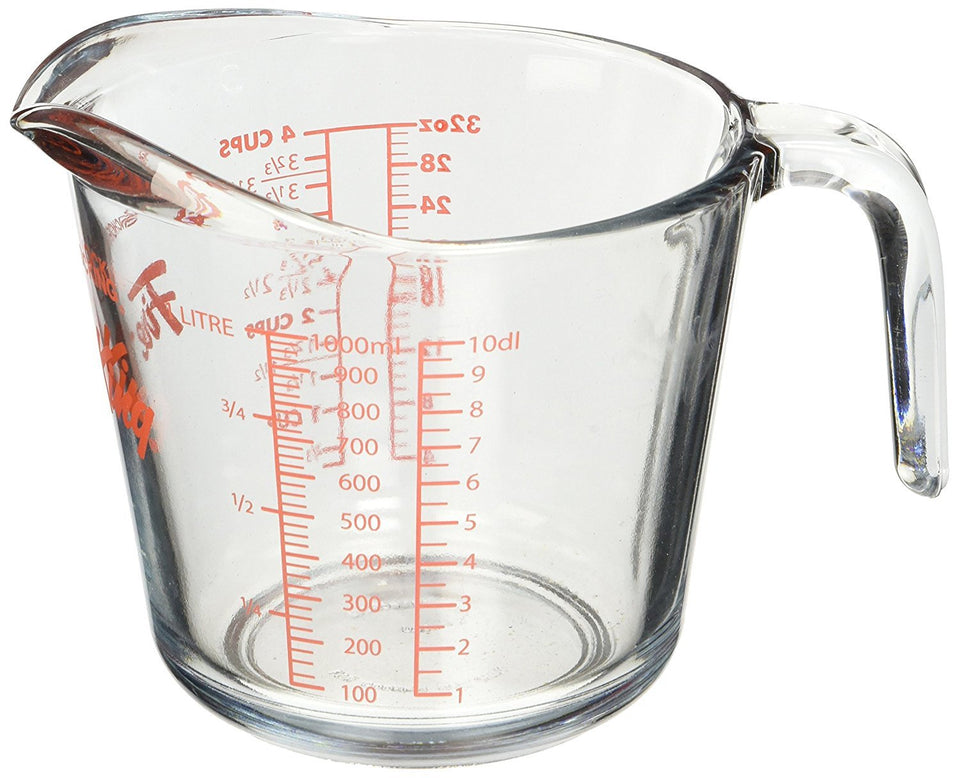Anchor Hocking Fire-King 4-Cup glass measuring cup with clear scale for precise pours.
