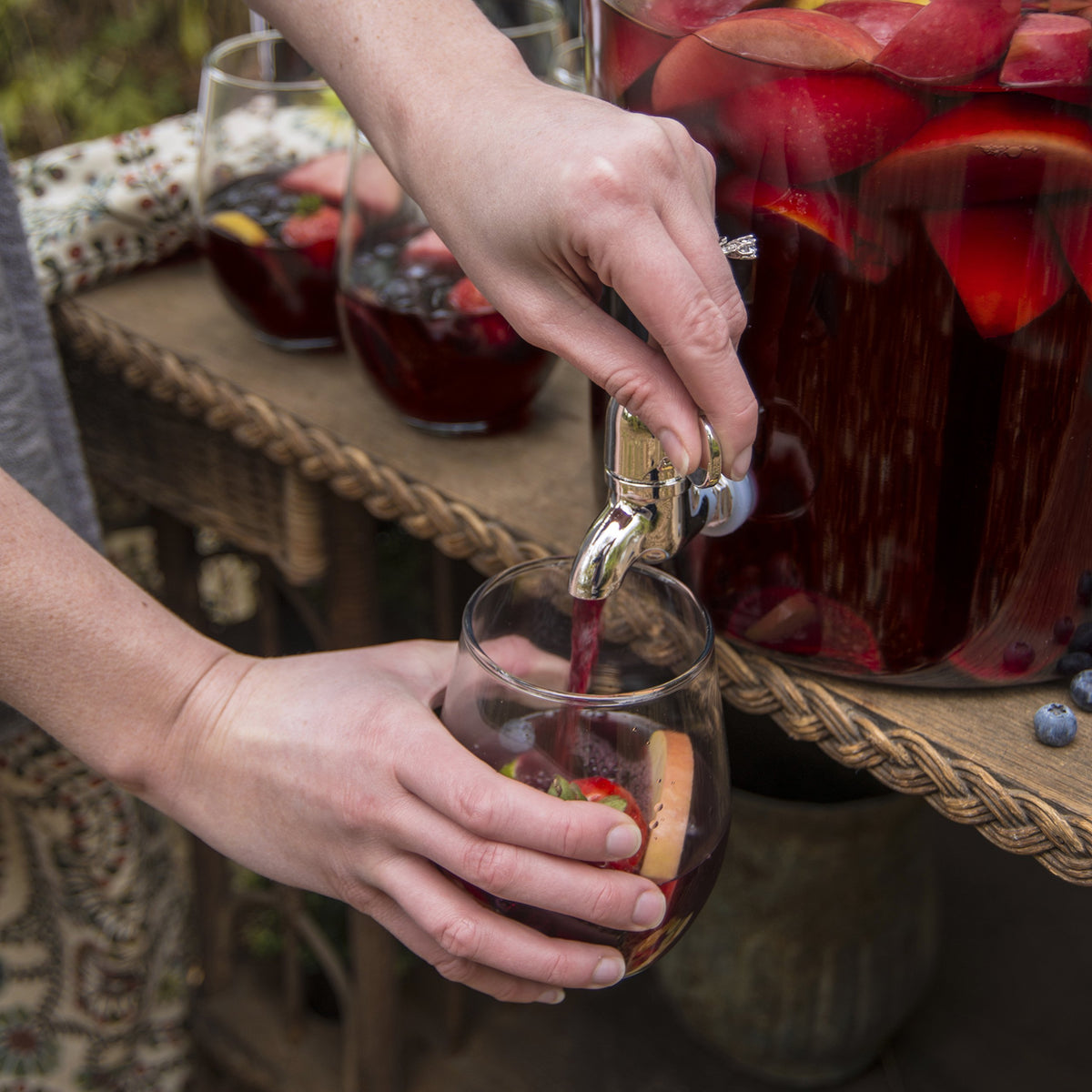 Heritage Hill dispenser with glass lid preserves freshness between pours.