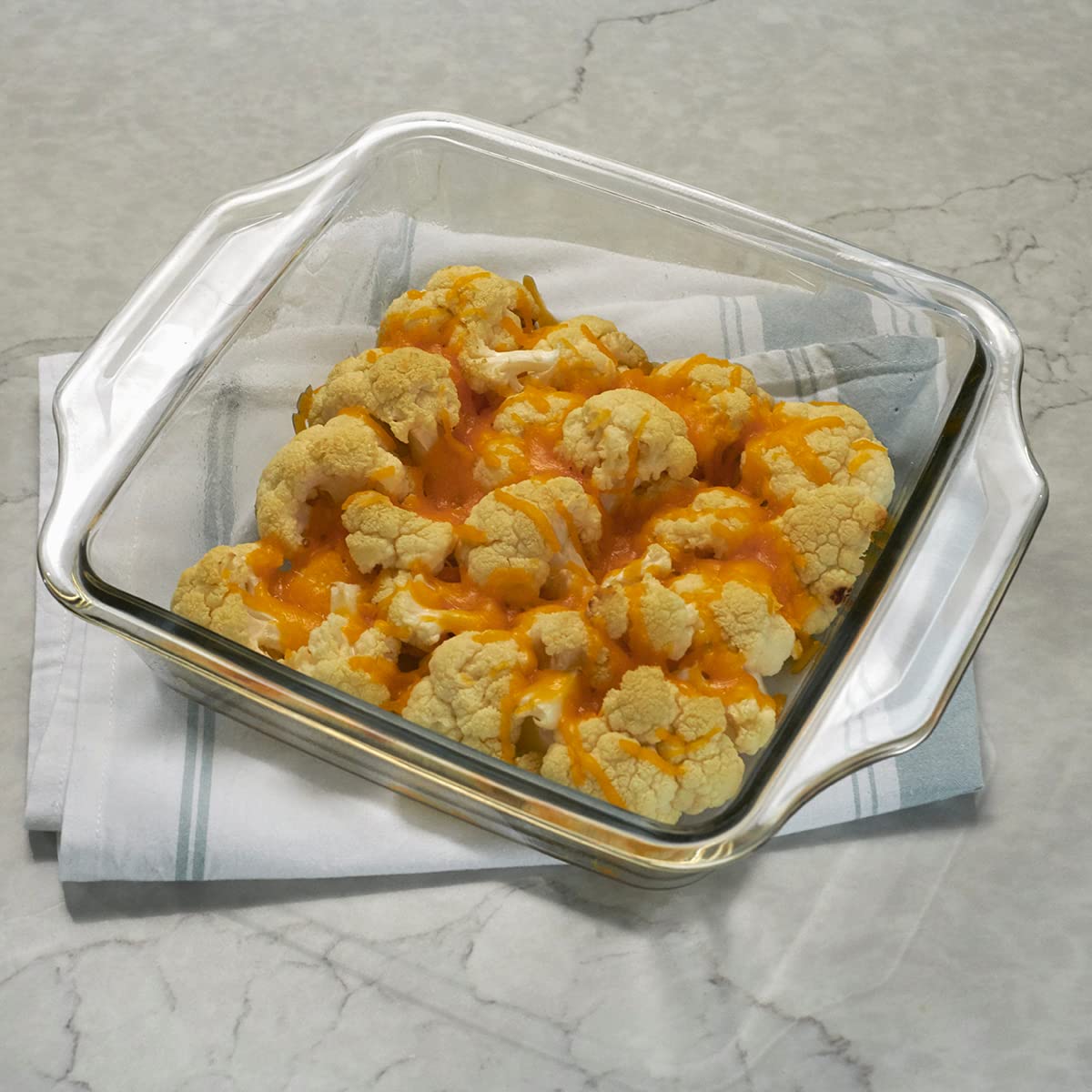 Anchor Hocking bakeware shown in kitchen-ready microwave and fridge environments.